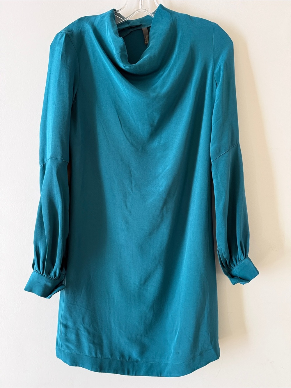 Satin Teal Dress with unique details.